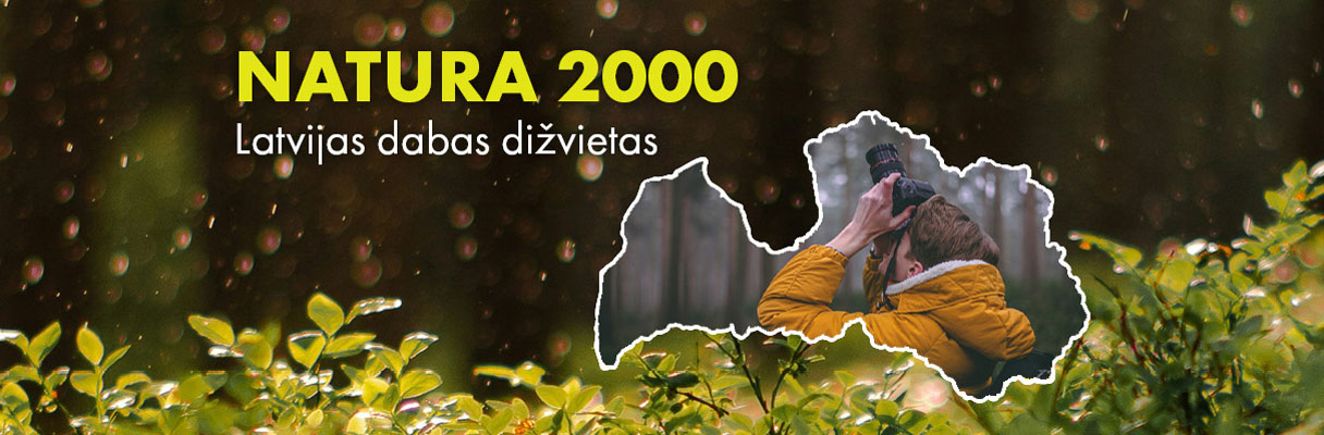 Cilvēks ar fotoaparātu